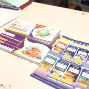 Travelzia promotional coupons and brochures on a table